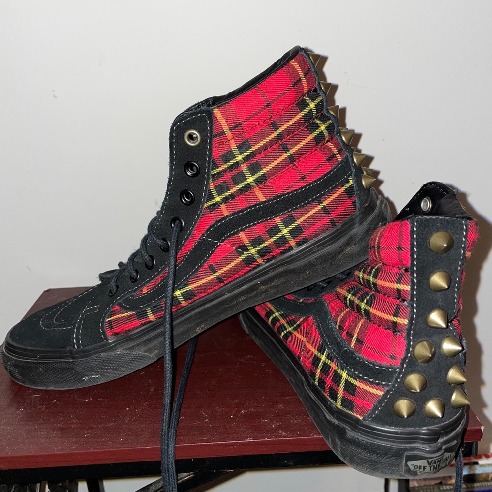 Vans women’s size 8 / 6.5 men , red and black plaid hi tops with spikes on heel